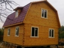дом из бруса с мансардой и ломаной крышей